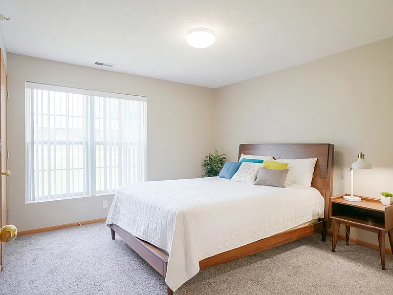 Our bedrooms offer a bright and serene space, perfect for relaxation and restful nights.
