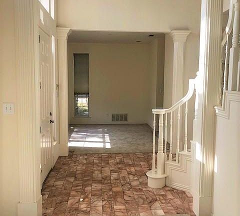 Entry with Formal Dining Room to left
and Formal Living Room to right