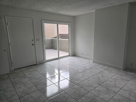 Living Room & Private Balcony