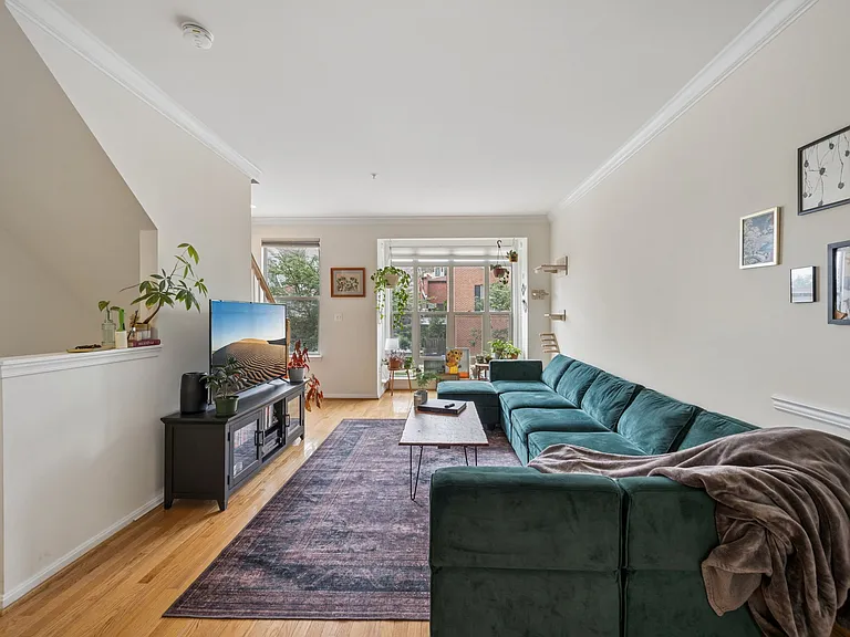 2nd Floor Contains Living Room, Half Bath, Kitchen, Dining Room, and Dining room balcony