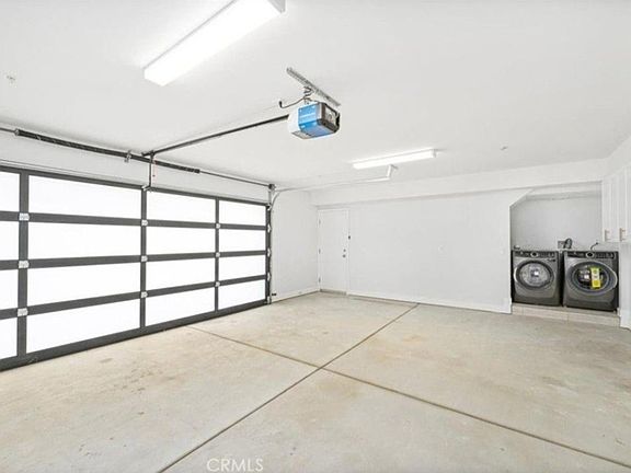Two car garage with washer/dryer
