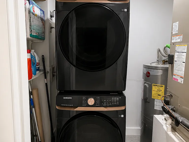 Brand New Smart washer/dryer and more storage in the laundry room. You'll also find your water heater & AC unit in here as well.