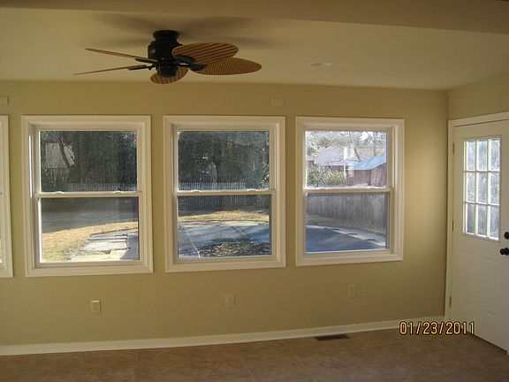 Sunroom overlooking inground pool