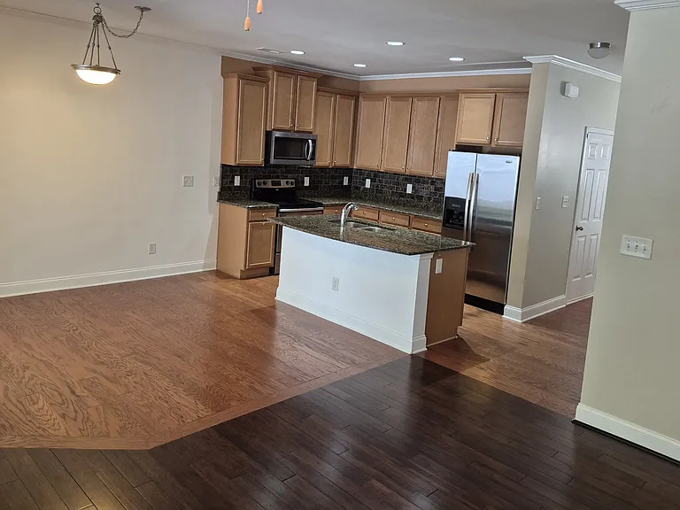 Kitchen and dining area from living room