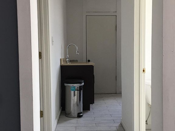 upgraded tile in kitchen and bath
