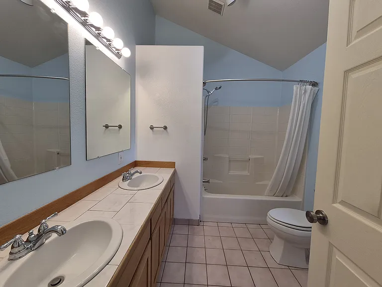 Master bathroom with full bath and 2 sinks