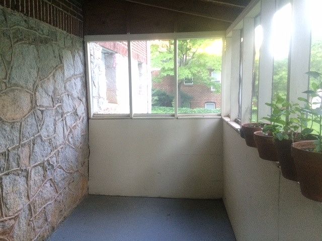 Enclosed porch with private entrance to the apartment