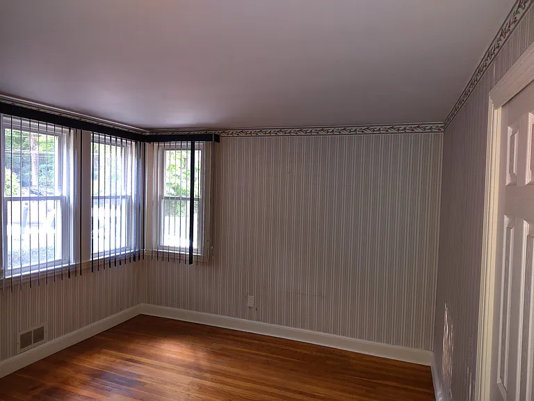 Front room, potential additional bedroom with closet, but no door.