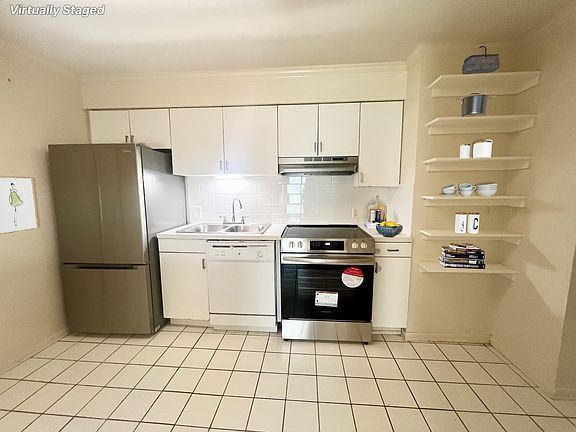 Brand new refrigerator, oven/stove/range and sink/garbage disposal, backsplash and exposed shelving