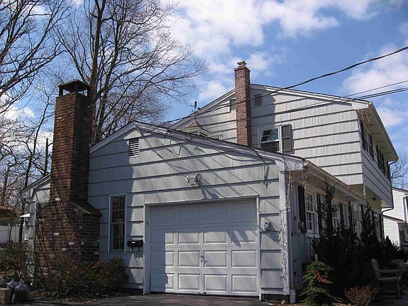 1 car garage and wood-fire buring fireplace chimney