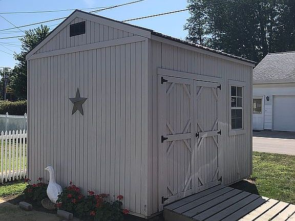 Utility shed in back