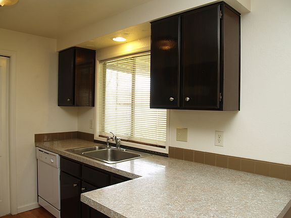 Kitchen has great view of backyard