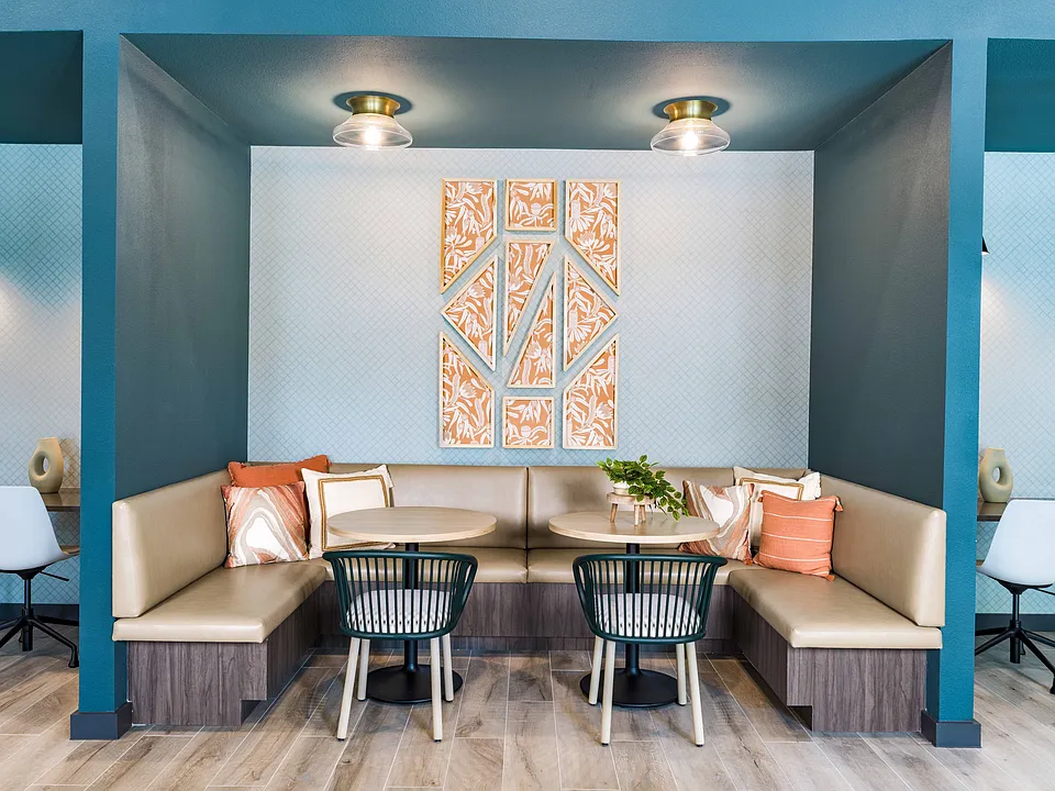 Boost your productivity at Modera Georgetown's coworking space, where innovation meets comfort. With access to private conference rooms, elevate your work game in style.