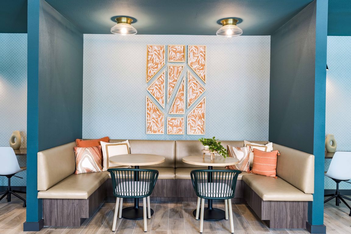 Boost your productivity at Modera Georgetown's coworking space, where innovation meets comfort. With access to private conference rooms, elevate your work game in style.