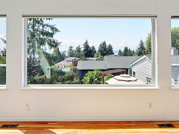 Watch the sunset as it goes behind the Olympics. 