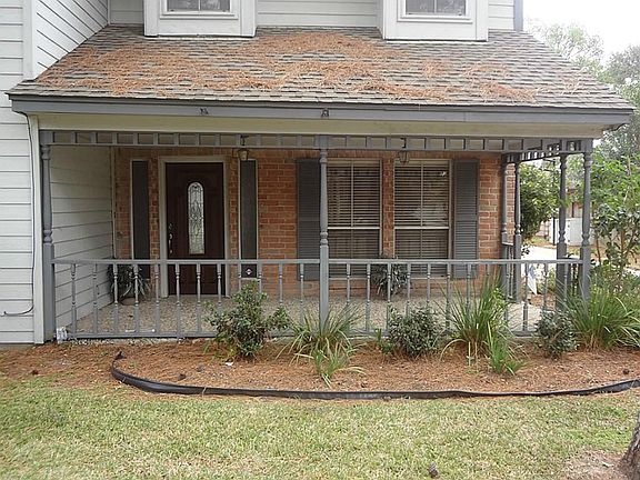 Enjoy the afternoon on the covered front patio.