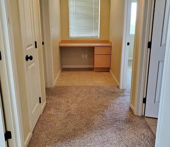 Upstairs hallway with build in desk