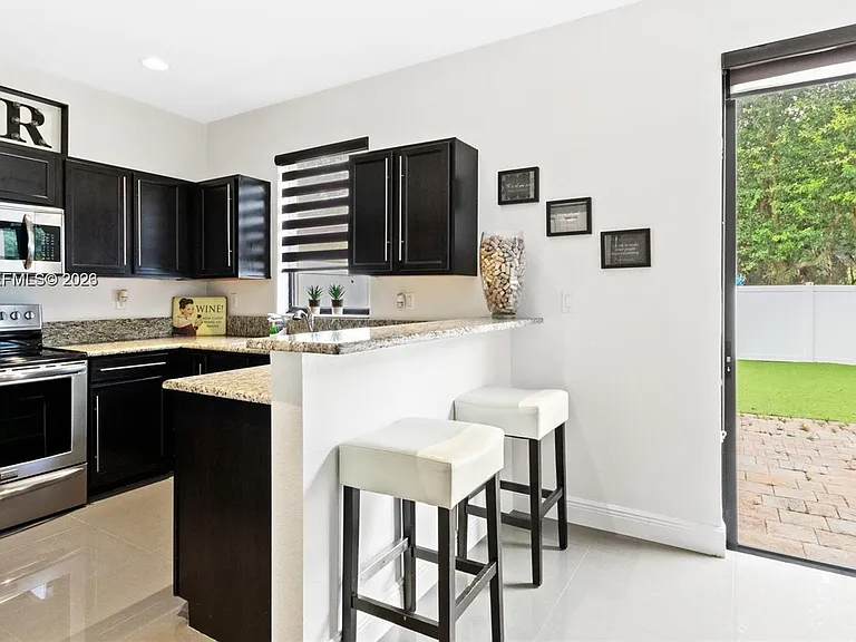 8925 W 33rd Ave — Photo 11