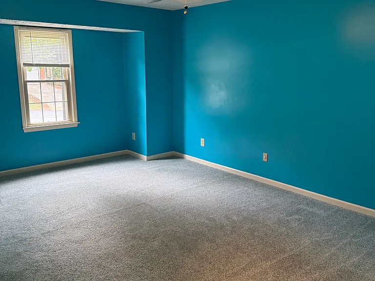 Calming blue colors in large master bedroom