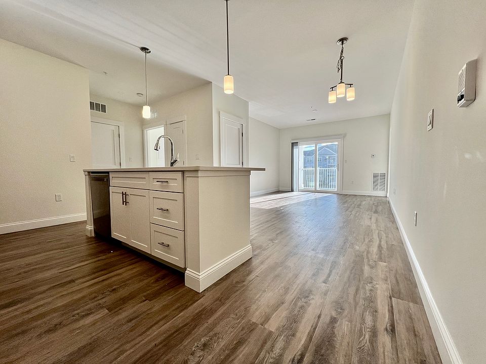 Kitchen, Dining & Living Room to Private Deck