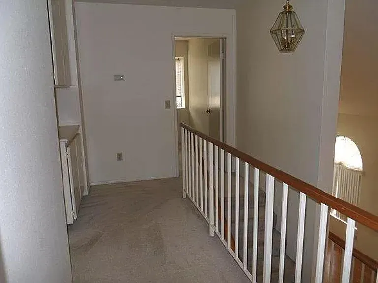 Walkway view to Jack-and-jill style bedrooms (#2 on left, #1 on right)