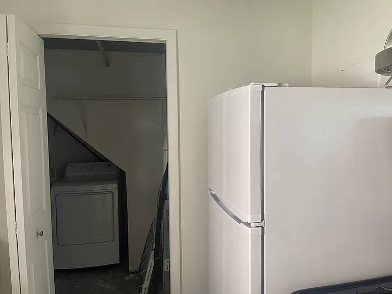 View from the kitchen into the laundry room