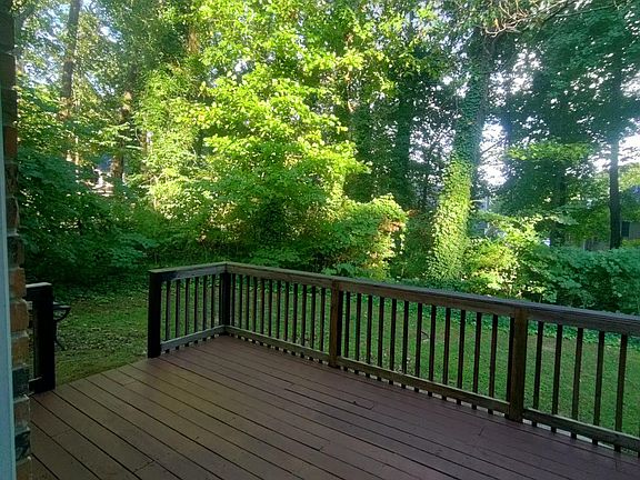 New deck overlooking large, private back yard!