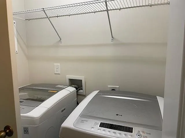 Washer and dryer located upstairs between the master and 2nd bedroom