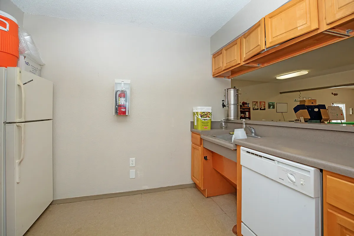 Photo 2 of 19 - River Trails Apartments - San Antonio, TX Community toom kitchenette - River Trails Apartments