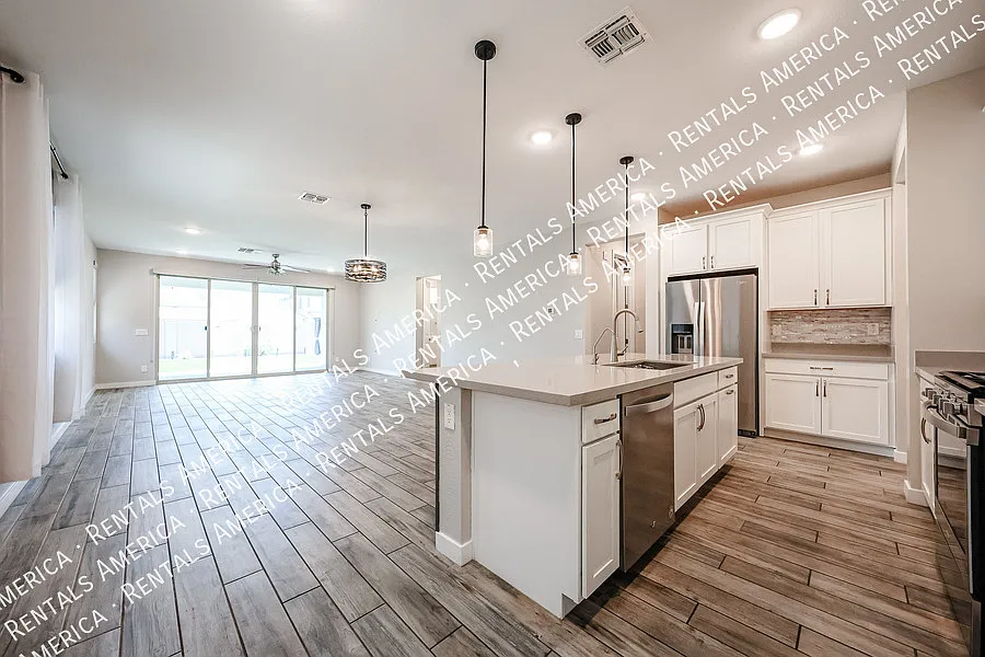 Upgraded 4 Bedroom Home with Private Guest Suite in Harvest — Photo 2