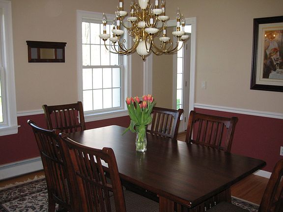 Formal dining room with crown molding