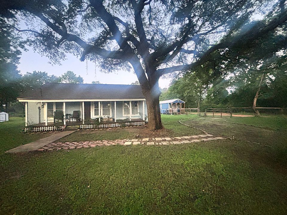 Front of house - circle driveway with entry gates