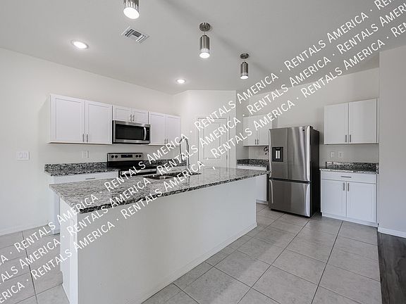 3rd image of 6015 E Athena Rd