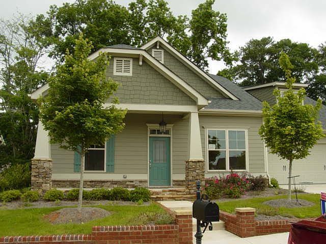 CUSTOM CRAFTSMAN COTTAGE HAS MUCH MORE ROOM THAN IT LOOKS