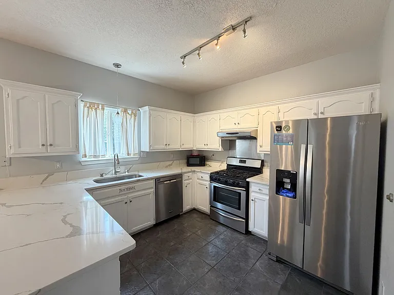 7300 Tricia Rd NE — Photo 13