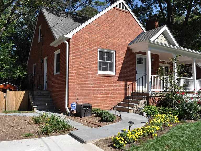 stone walkway to front yard, side door and back yard