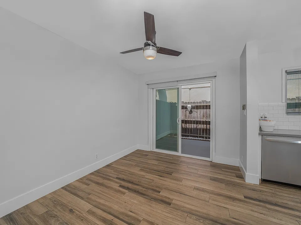 Unit 11 dining area next to your gourmet kitchen. Walk out to your private patio.