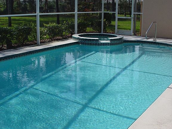 View of pool and hot tub