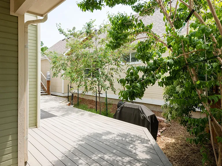 Side patio deck with grill