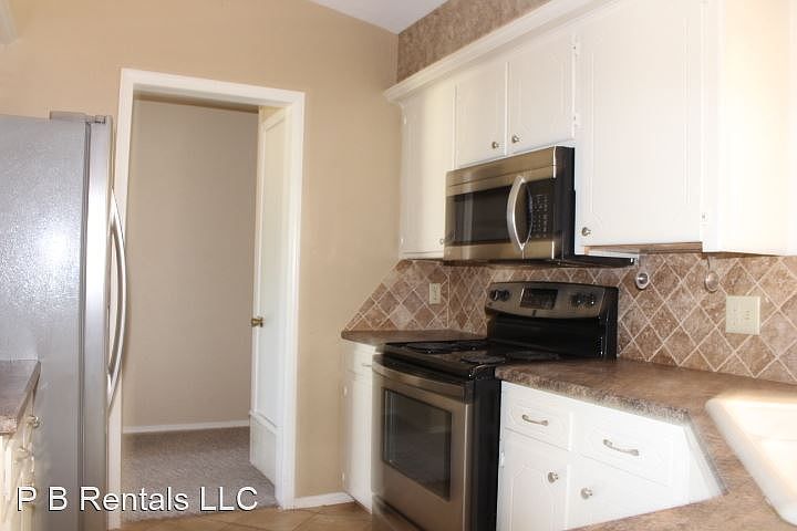 1st image of 6920 NW Sprucewood Dr