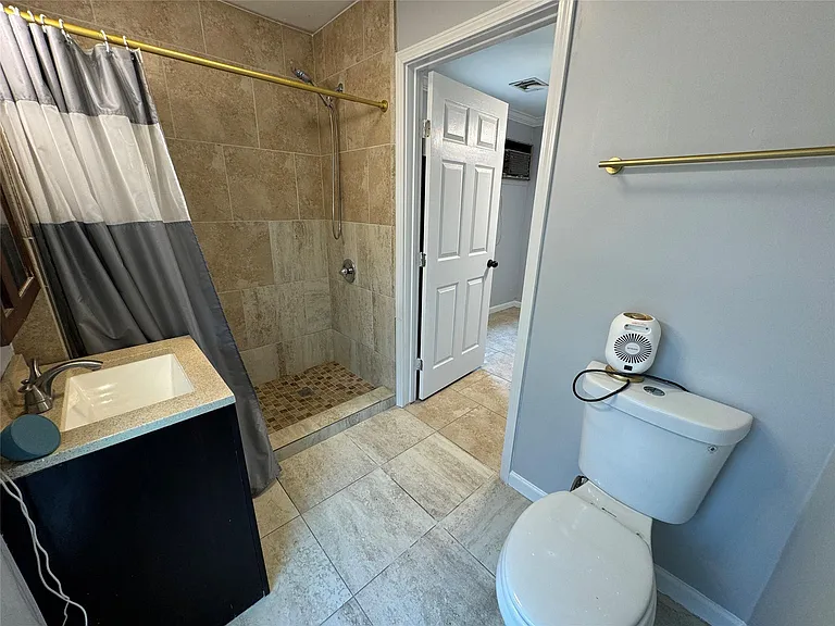 7910 Sands Point Dr — Photo 27