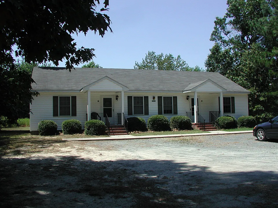 Front of Building and Parking Area