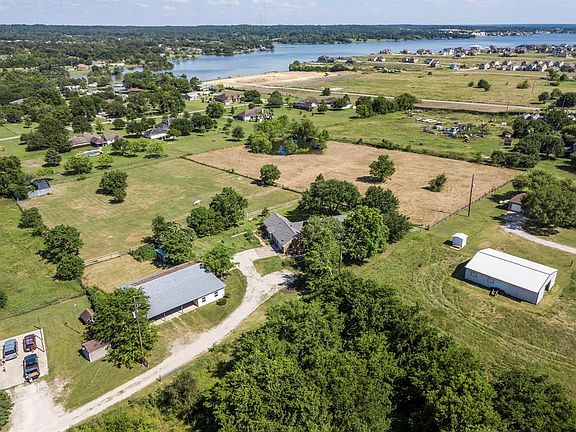 Look at the proximity of this property to Lake Conroe. It's a beautiful view from the back porch.