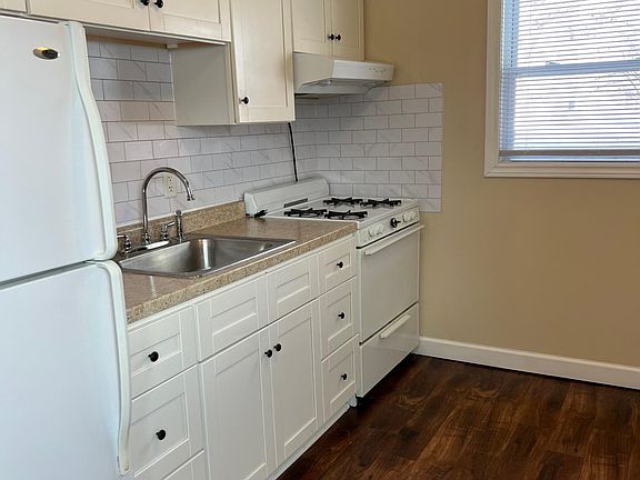 Vinyl plank "dark wood" flooring thru-out main living area