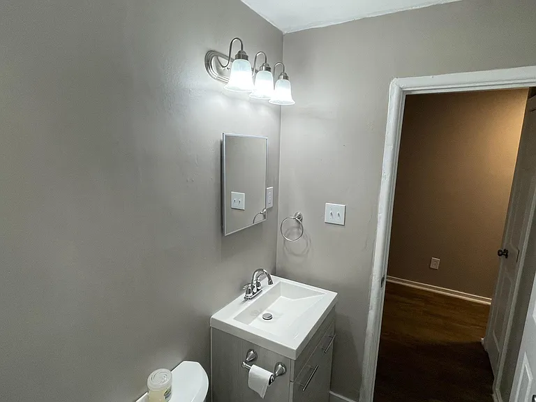 Bathroom, looking back into the hallway