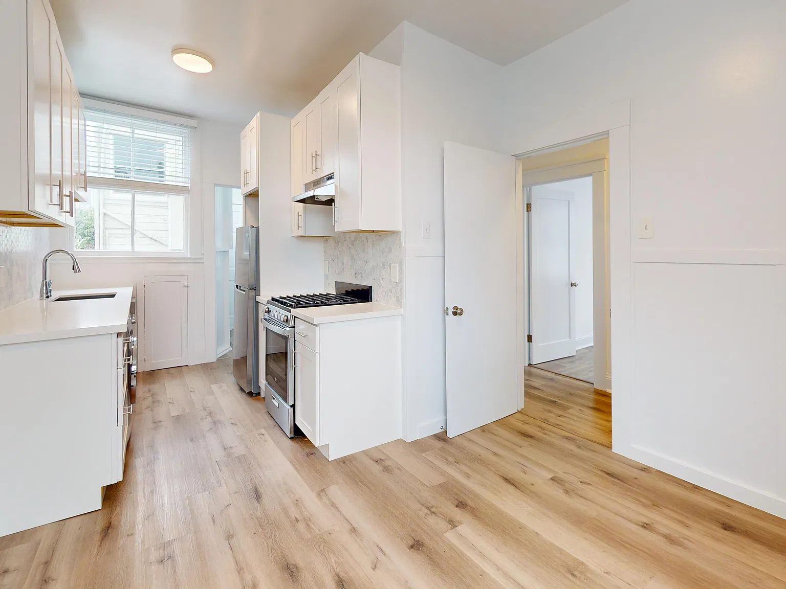 Large 1 BR - Top Floor remodeled with Laundry in Unit! — Photo 3
