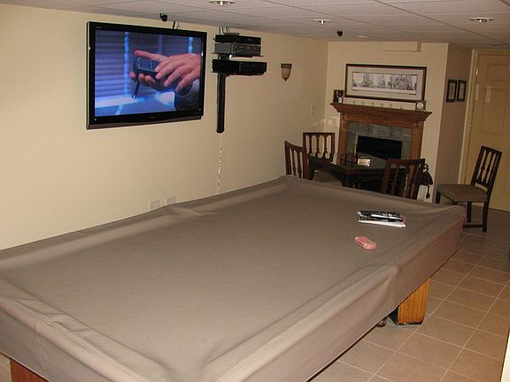 Gameroom with gas log fire place