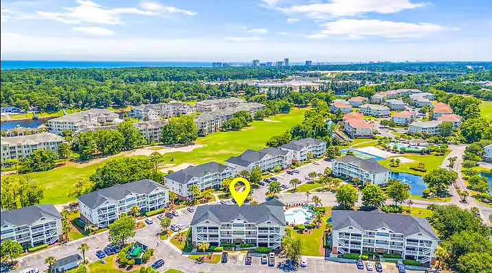 An aerial view of Barefoot Resort and Golf and some of the surrounding greens! Home to 4 award-winning golf courses (Norman, Love, Fazio, and Dye).