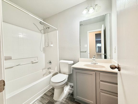 Common Full bath with FRESH wall & vanity PAINT and NEW flooring