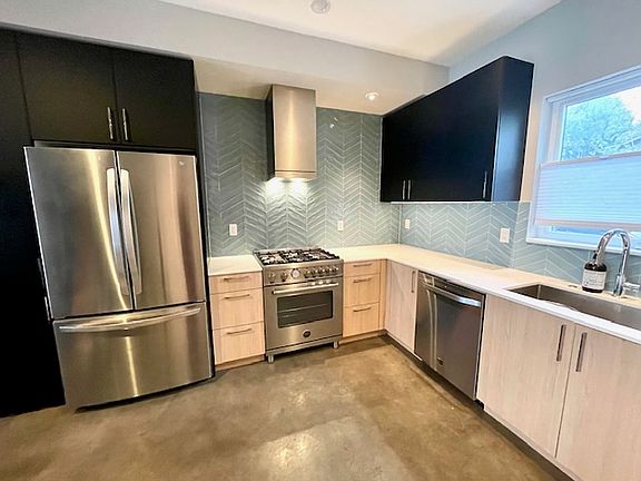 kitchen area with high end appliances